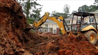 Cat 420E Backhoe Digging [upl. by Broeder]