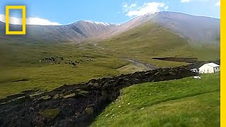 Bizarre ‘LavaLike’ Landslide Tears Through Hillside  National Geographic [upl. by Ativak]