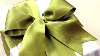 Como hacer moño para regalo  How to tie a gift bow [upl. by Annala732]