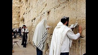 A Jewish prayer at the Western Wall Wailing Wall Jerusalem Israel [upl. by Eolcin]