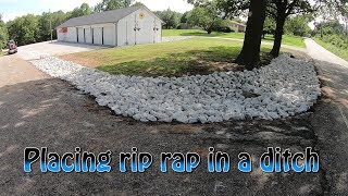 Placing Rip Rap In A Ditch [upl. by Rebmeced]