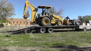 How To Load A Backhoe [upl. by Ahseiyn420]