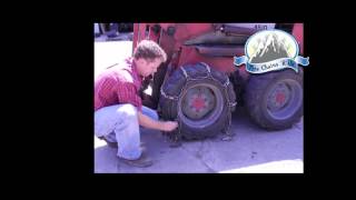 How to Install Skid Loader Tire Chains [upl. by Esilegna549]