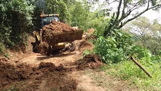 Trabajos con un🚀 RETROCARGADOR CAT🚜416 E perfilando y anchando carreteras o VIAS quotretroexcavadoraquot [upl. by Annasiul389]