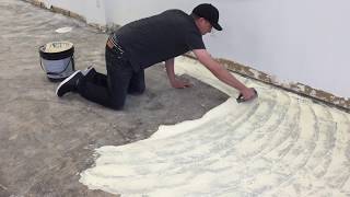 Spreading glue How to glue down carpet [upl. by Ahsenal]